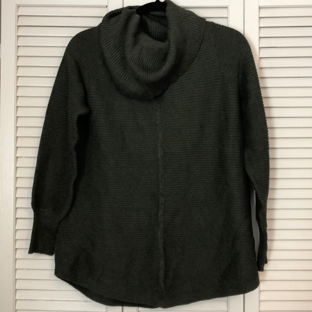 Green turtleneck sweater